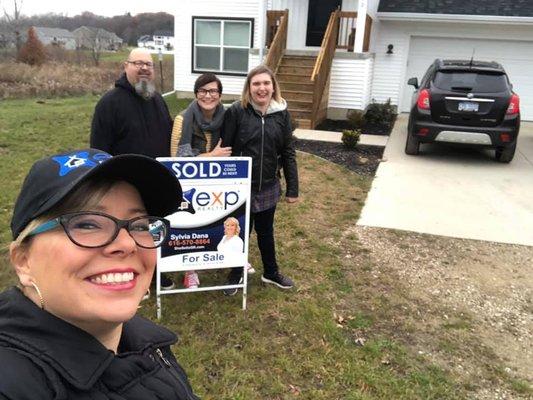 Laura, Tony and their daughter Olivia on the first morning at their new house!