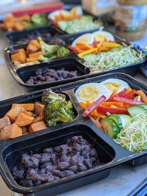 Protein and veggie bento boxes.