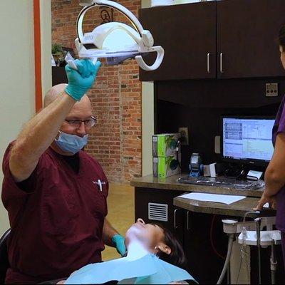 Dr. Youngblood examining patient