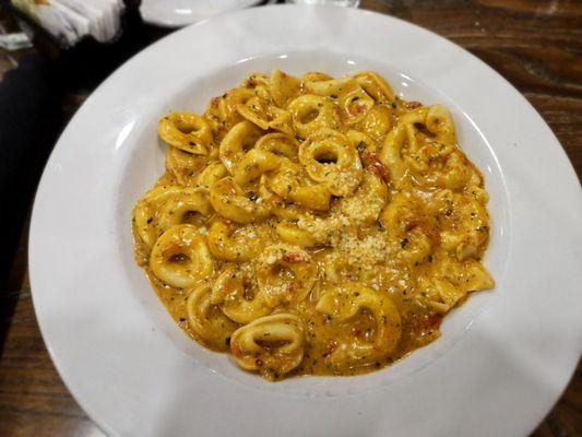 Tortellini Tre Salsa - Cheese tortellini sauteed in our unique blend: Marinara, alfredo, and pesto sauce