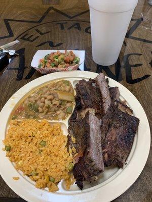 Two meat plate - fajitas, finger ribs, rice and charro beans