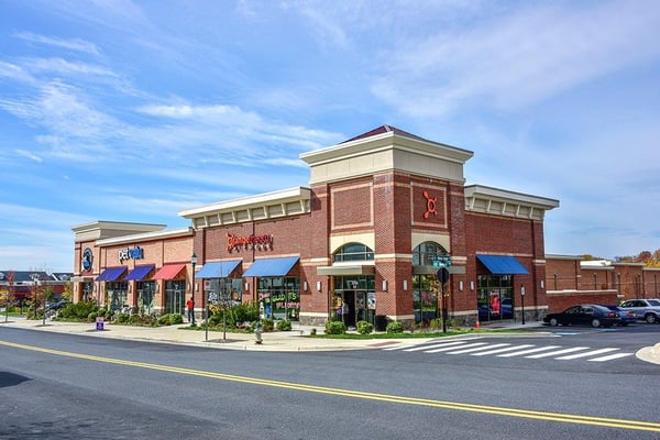 In the Clarksburg Village Center, near Harris Teeter