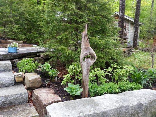 woodland garden border within a terraced patio