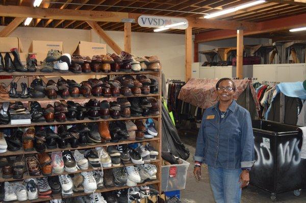 VVSD Staff Member at our warehouse. Here we store donated items to later distribute to VVSD clients.