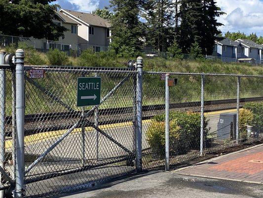 The gate that is open so you can board the train