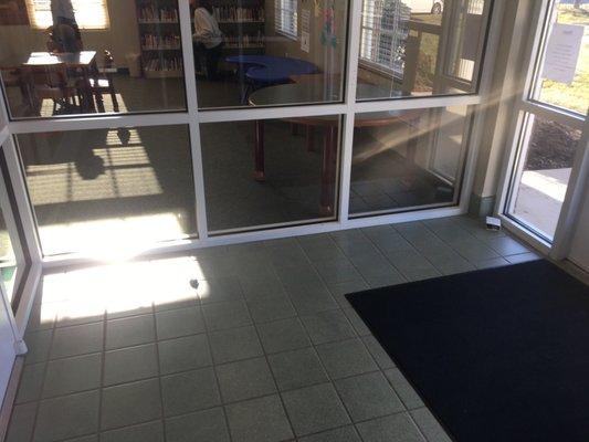 Lobby where Carolyn prefers children to sit on the floor and eat next to a roach hotel