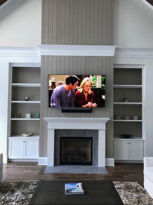 Sound Bar was so close to the TV you could only see they were not touching from the side.