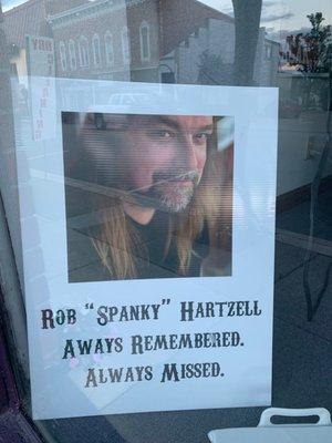 Businesses on Main St in Mount Pleasant put up these signs in their windows after Spanky's passing.