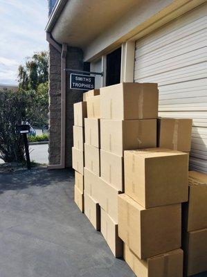 Boxes of trophies ready for a pick up