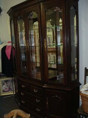 A stunning hutch waits to grace someones dinning room.