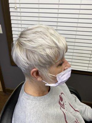 Icy textured pixie haircut, with a soft natural hairline at the back.