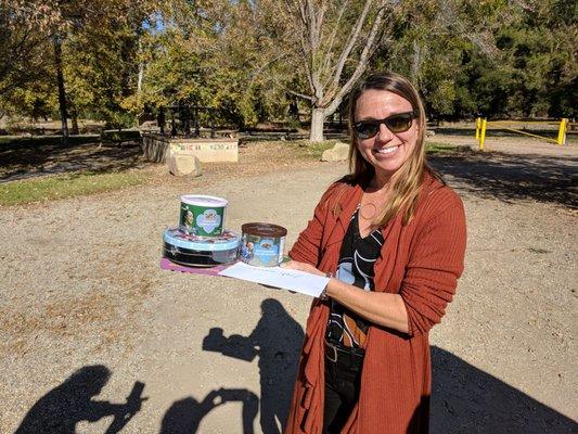 CEO Jody Skenderian displays some of the Girl Scouts treats.