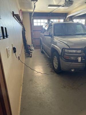 Our gear was hanging to dry everyday on the rack in the garage this car was not plugged in all week. Now it's plugged in.