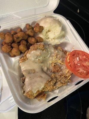 Pork cutlet dinner. Tomatoes was from a separate chef salad. Okra was really good as well as the cutlet