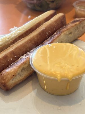 Half order of breadsticks with nacho cheese