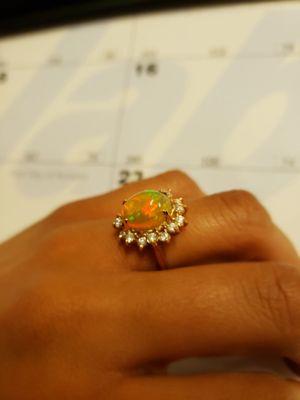 Stunning fire Opal and diamonds, 18k rose gold engagement ring from blue moon forever.