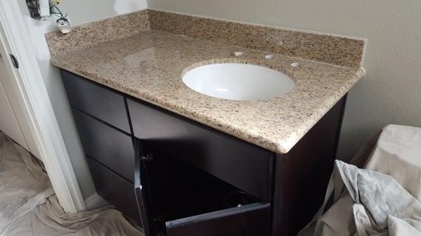 Guest bathroom - while in progress.  New vanity, sink and granite top.