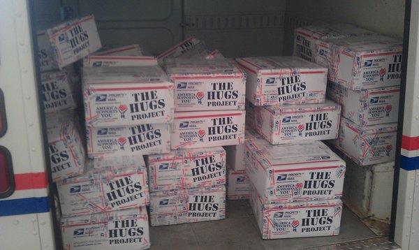 Weekly Care Packages in the USPS truck