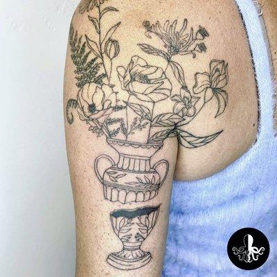 flower vase fine line tattoo