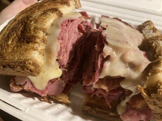 $17.99 (through Grubhub) The New York Yankee Sandwich has 3/4 pound of both hot corned beef and pastrami.