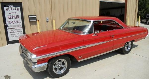 Front of the business with Ken's favorite car. 1964 Ford Galaxie 500.