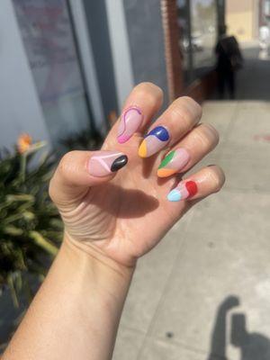 Abstract colorful nails done by Tracy