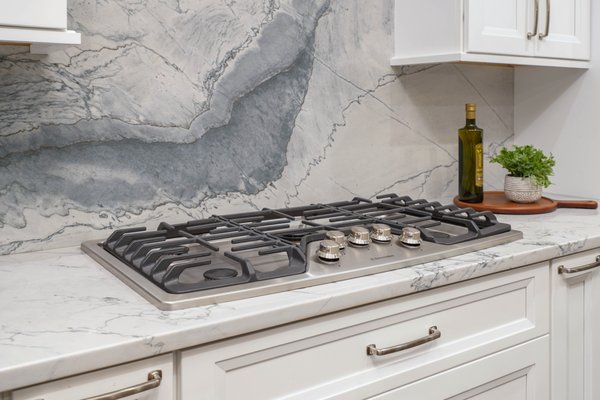 Quartzite full height kitchen backsplash