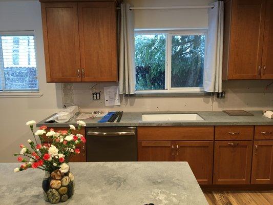 We weren't quite done in the photo... no backsplash or faucet etc., but you can see how lovely the cabinets look.