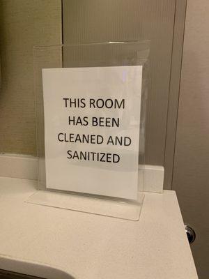 Signs reassuring patients that exam rooms have been cleaned and sanitized.