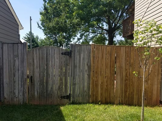 Power washing, the fence on the right looked the same until we power washed it.  Then to come back and seal it!