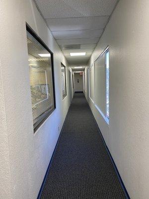 Down the hall. Second door on the left.