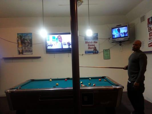 A couple tv's and a pool table. Jukebox, patio and grub on Wednesdays.