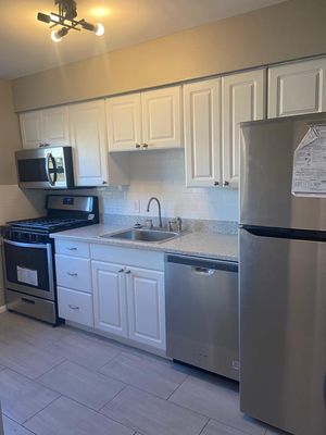 Appliance installation, subway backsplash, tile flooring and cabinet repair!