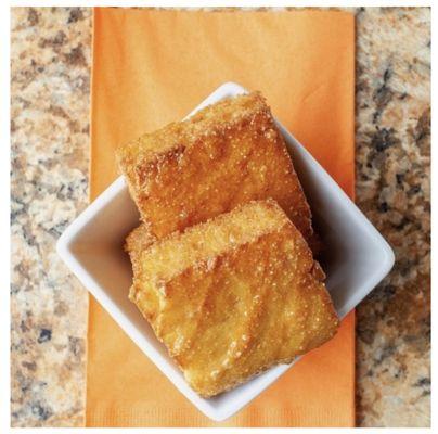 Honey Fried Cornbread...

Deep Fried Cornbread Drizzled with Honey.
Crispy on the outside, moist on the inside and delicious throughout.