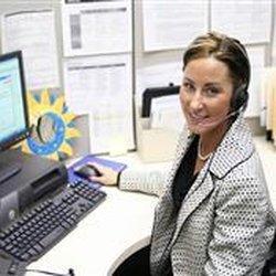 One of our employees happily manning the phones in our Myrtle Beach, SC bail bonds office.