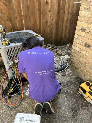 One of our Install Gurus finishing up the final touches on a home A/c system.