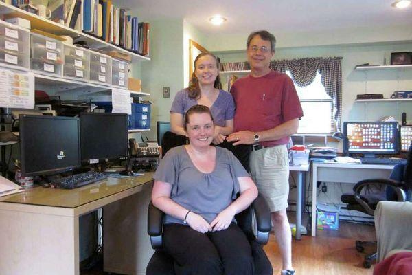 Co-founders, Shannon and Fred Converse (standing). Office Manager, Erin Bennedum (seated)