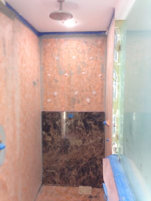 New custom shower stall being installed for a residential customer. Jordan & Sons does tile work also.