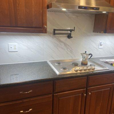 Stovetop and tile backsplash installation