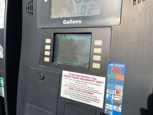 Fuel pumps with unreadable displays.