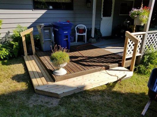 Added a step and railings to existing deck.