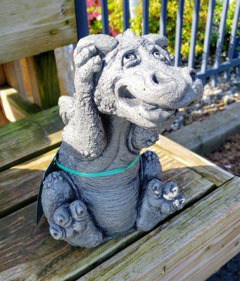 He is called "Little too much Noise" dragon. Perfect to have near the wind chimes.