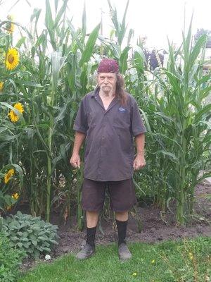 Mark Hall in front of my corn. Here in Klamath Falls,Or.