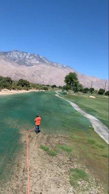 Hydroseeding a golf course in Palm Desert