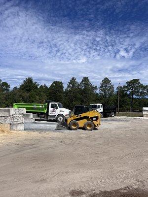 Stone sand fill mulch and container rental.