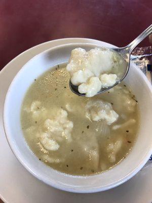 Chicken Dumpling soup. I was expecting cream. Was broth but fantastic. Dumplings very hearty.