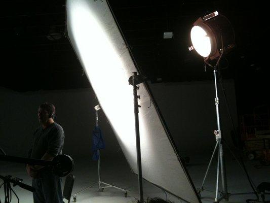 Getting the lighting just right in the studio.