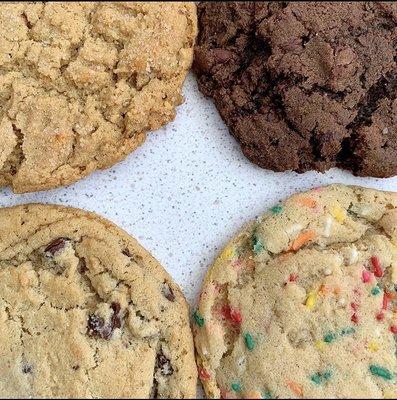 A peanut butter cookie, cocoa cookie, chocolate chip cookie, and confetti cookie walk into a bar....