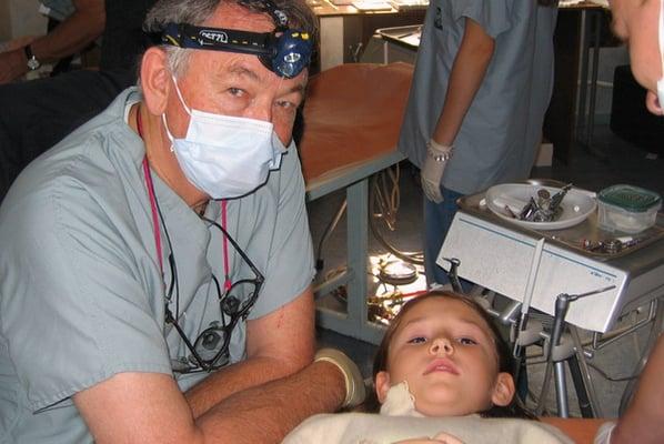 Ukraine, 2005.  Dr. Holyoak provided dental care for children at an orphange.