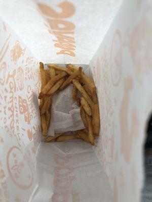 Fries thrown in bag